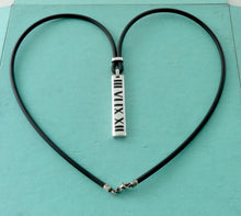 Laden Sie das Bild in den Galerie-Viewer, Authentic Tiffany & Co. Atlas Necklace Sterling Silver Black Enamel Pendant Rubber Black Cord Surfer Necklace