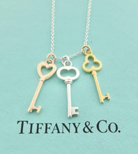 Laden Sie das Bild in den Galerie-Viewer, Tiffany & Co. Three Key Necklace 18k Yellow Gold Rose Gold Sterling Silver Mini Pendant Trefoil Heart Oval 3 Keys necklace