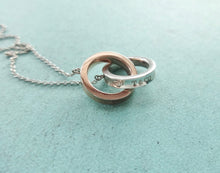 Load image into Gallery viewer, Authentic Tiffany &amp; Co. 1837 Interlocking Circles Necklace Pendant Sterling Silver Rubedo Necklace Small
