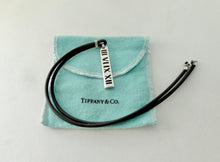 Laden Sie das Bild in den Galerie-Viewer, Authentic Tiffany &amp; Co. Atlas Necklace Sterling Silver Black Enamel Pendant Rubber Black Cord Surfer Necklace
