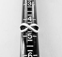 Load image into Gallery viewer, Authentic Tiffany &amp; Co. Infinity Ring Sterling Silver Infinity Figure 8 Band Ring Size 4.5
