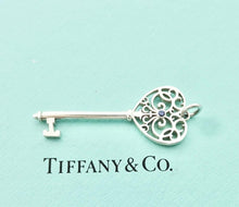 Load image into Gallery viewer, Authentic Tiffany &amp; Co Enchant Heart Key Charm Blue Sapphire Sterling Silver Scroll Pendant Necklace
